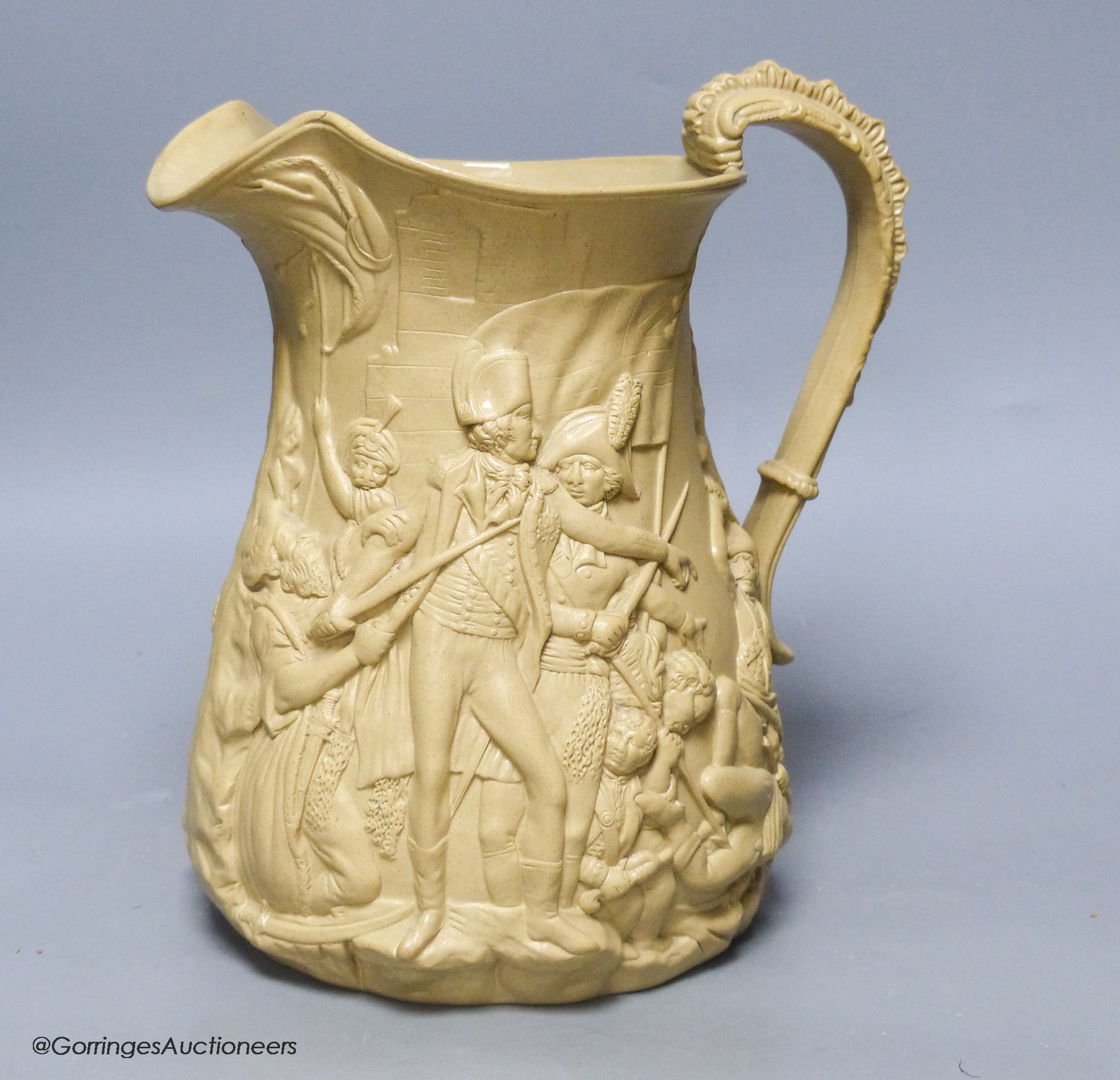 A Victorian relief moulded buff coloured stoneware jug by Samuel Alcock, The Seige of Acre, circa 1850.